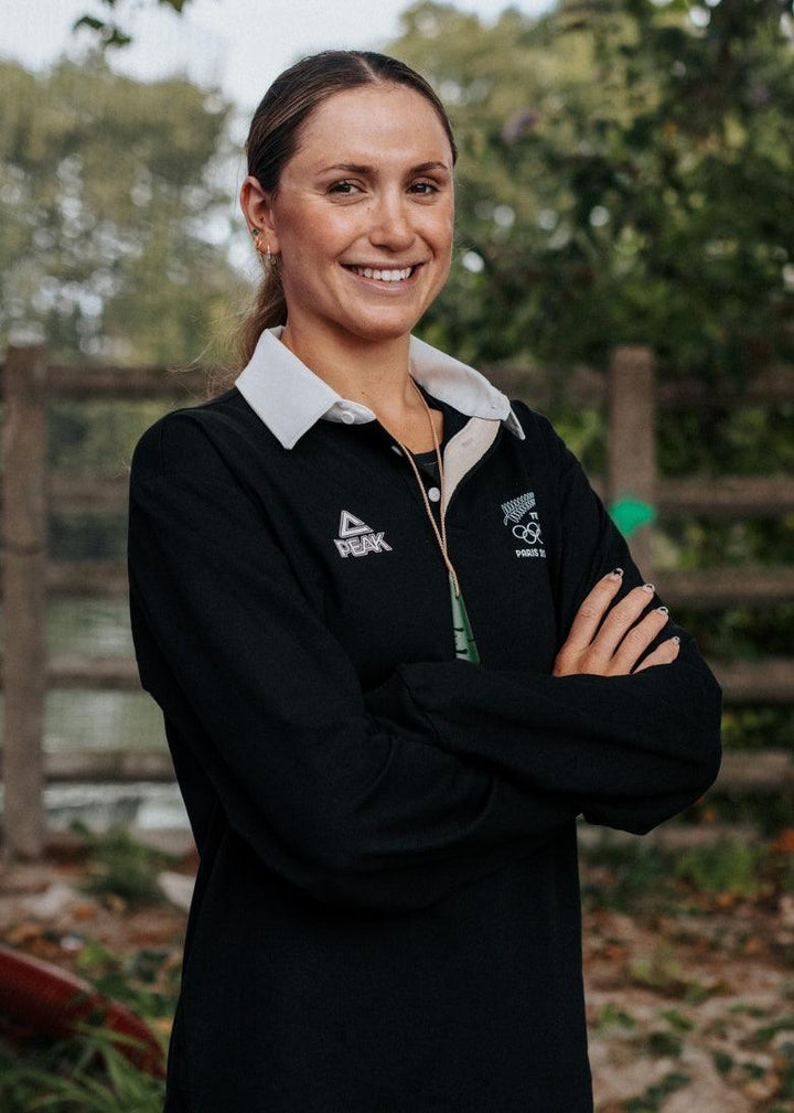 Eve Thomas, a New Zealand Olympian smiling. Eve is an ambassador of Florist.co.nz and loves flowers.
